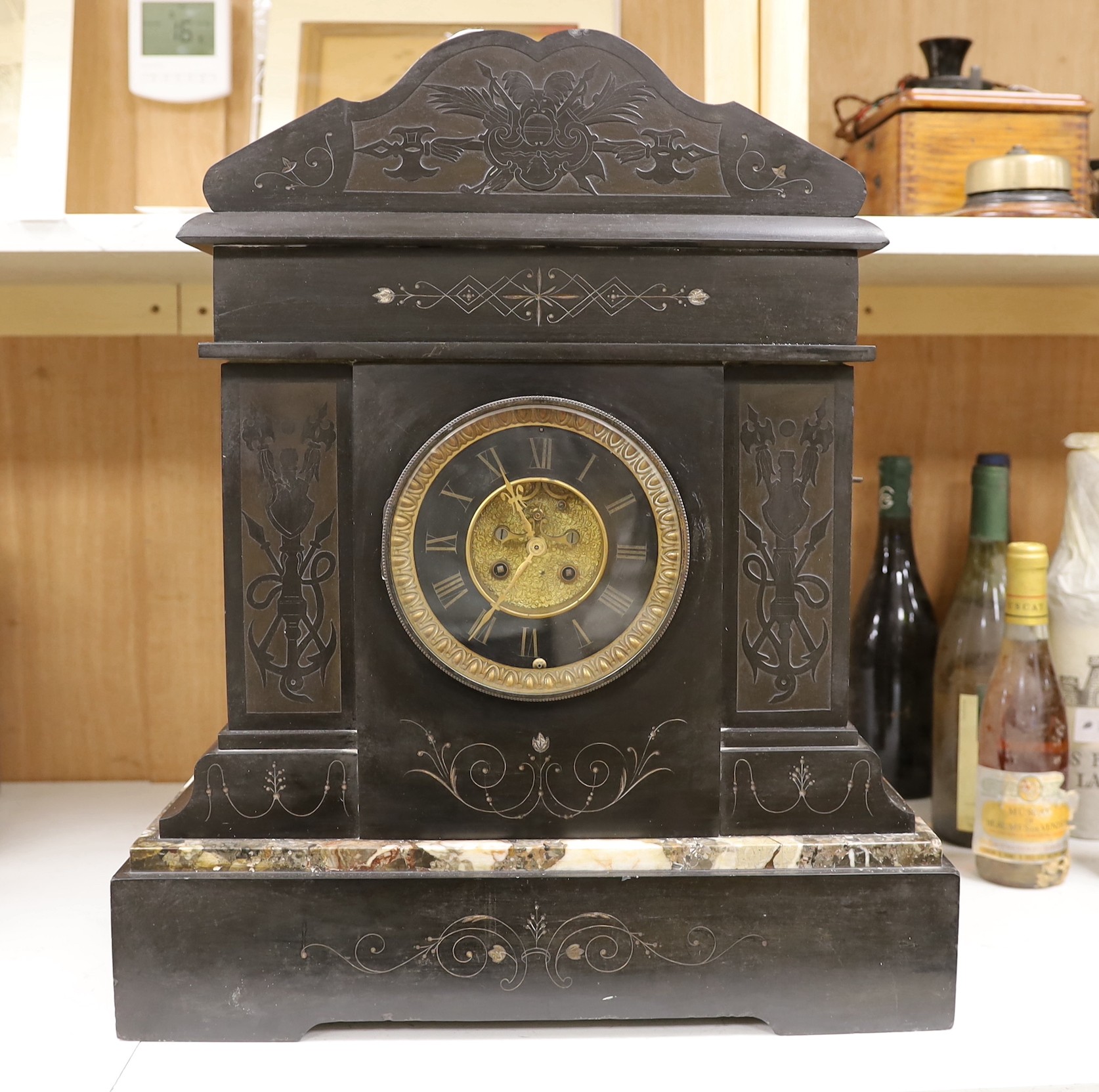 A large Victorian black slate mantel clock, 54.5cms high